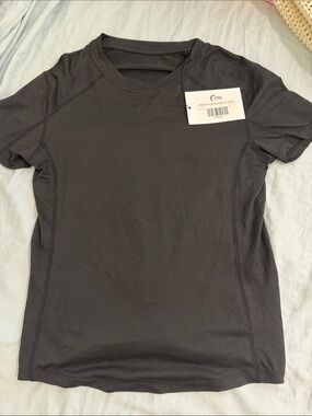 ZYIA Black Short Sleeve Performance Tee back tie